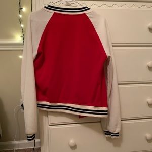 letterman jacket with the letter “A”